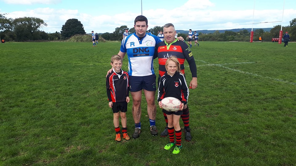 Tralee Captain Micheal Maher, Killarney Captain Peter Kelly and mascots Lachlan and Naoise